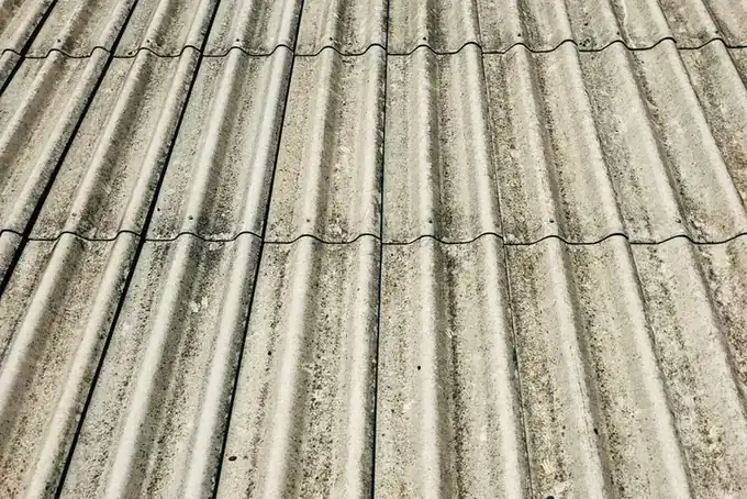Grey corrugated cement roof sheets of the profile used on older sectional garages around Weston-super-Mare