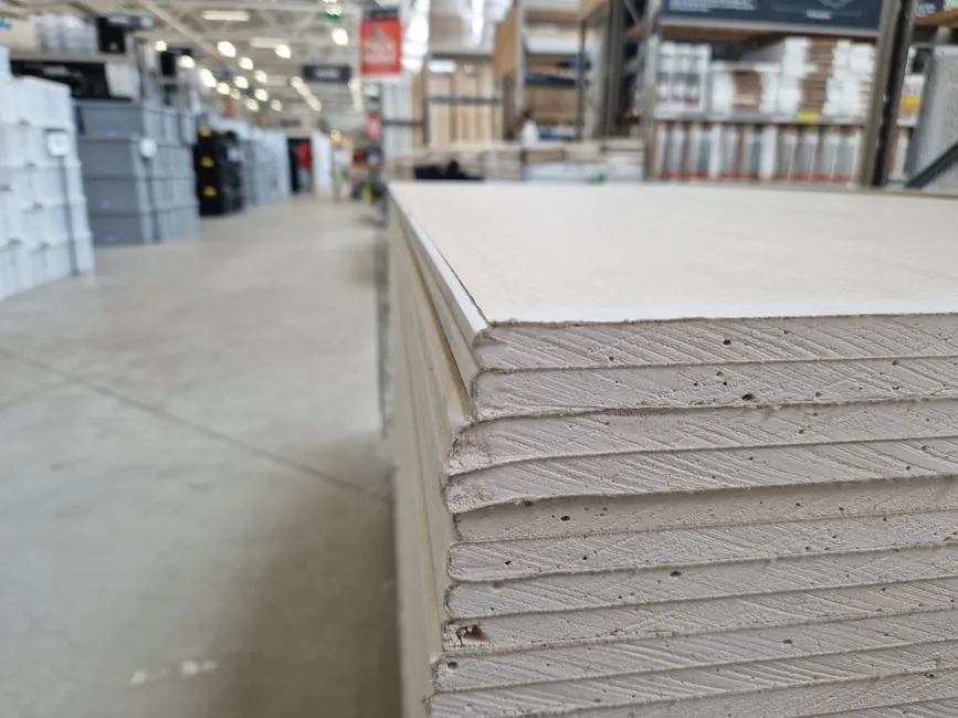 Stacked rigid boards showing the edge thickness that decides a flat roof build-up height in Weston-super-Mare