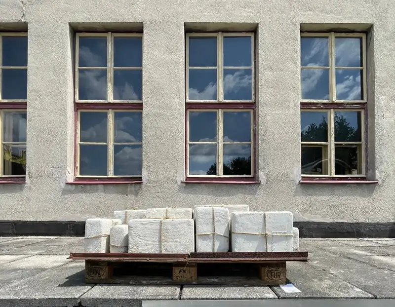 Building materials delivered on a pallet ready for a flat roof rebuild in Weston-super-Mare