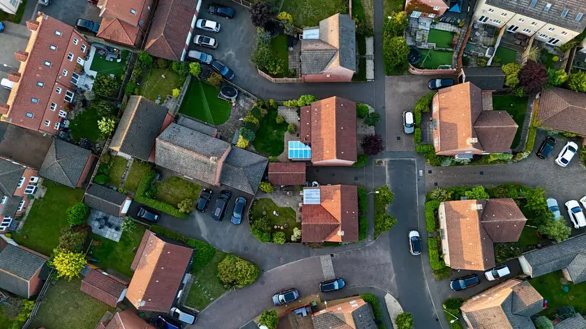 Aerial view of a British suburban estate showing garage and extension flat roofs of the type common across Weston-super-Mare