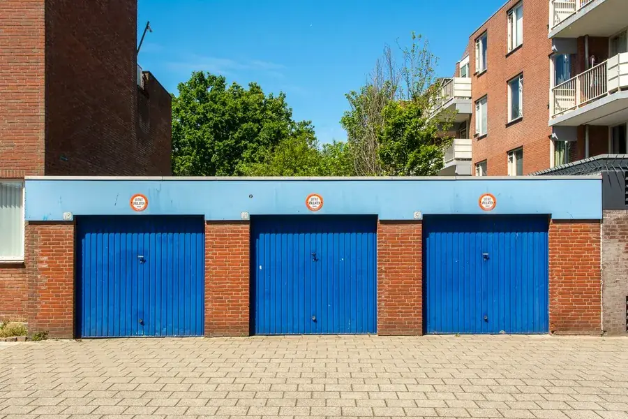 A block of brick garages with flat roofs and up-and-over doors, the type found all over Weston-super-Mare