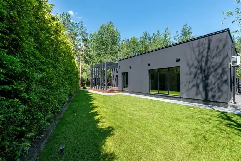 A modern single-storey building with a flat roof - the construction the old reputation never met