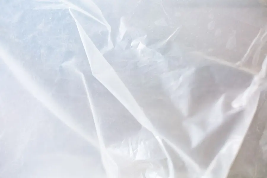 Protective sheeting used as a temporary cover while permanent repairs are arranged