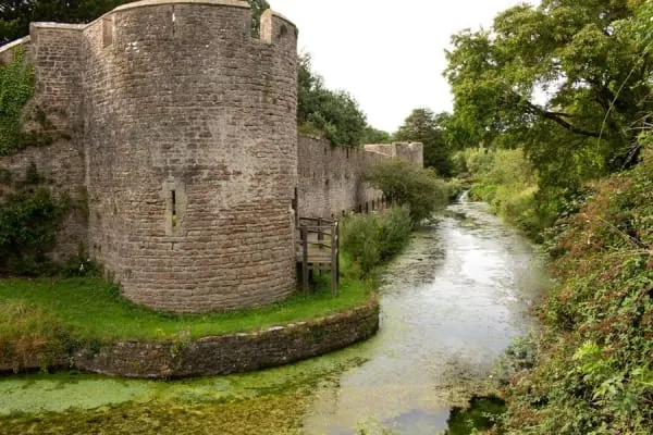 Old castle walls beside a moat, the kind of setting the Museum of Somerset occupies at Taunton