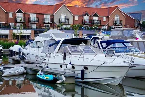 Yachts berthed in a modern marina below apartment buildings, the waterfront heart of regenerated Portishead