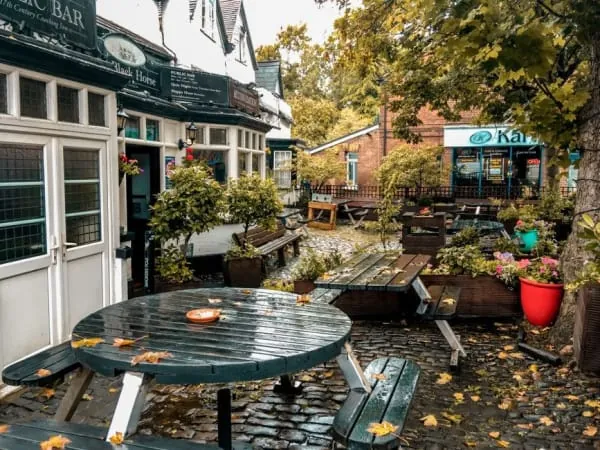 Picnic tables in a village pub garden, the kind of welcome Bleadon's locals put on after a walk off the hill