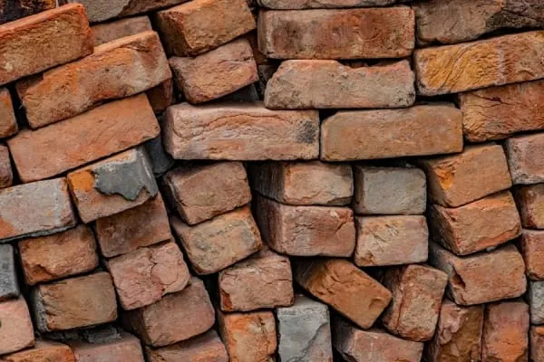 Stacked clay bricks and tiles of the kind fired for generations at Bridgwater's East Quay kilns