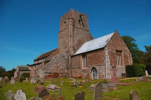 A medieval church and churchyard of the kind St Andrew's has anchored Congresbury with for eight centuries