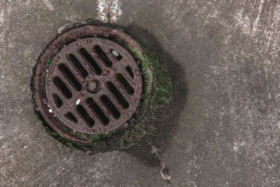A roof drainage outlet with a debris grating, the first point to fail on a flat roof in Weston-super-Mare