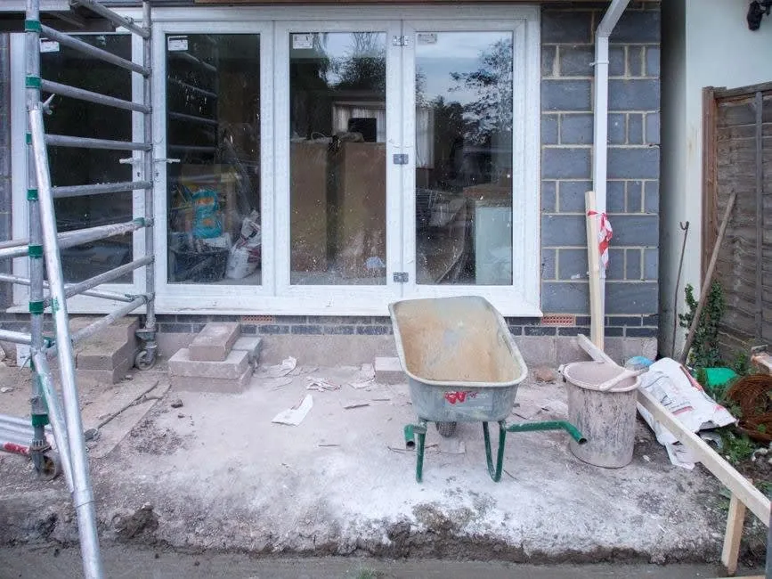 A rear extension under construction where a rooflight is being retrofitted into a flat roof in Weston-super-Mare