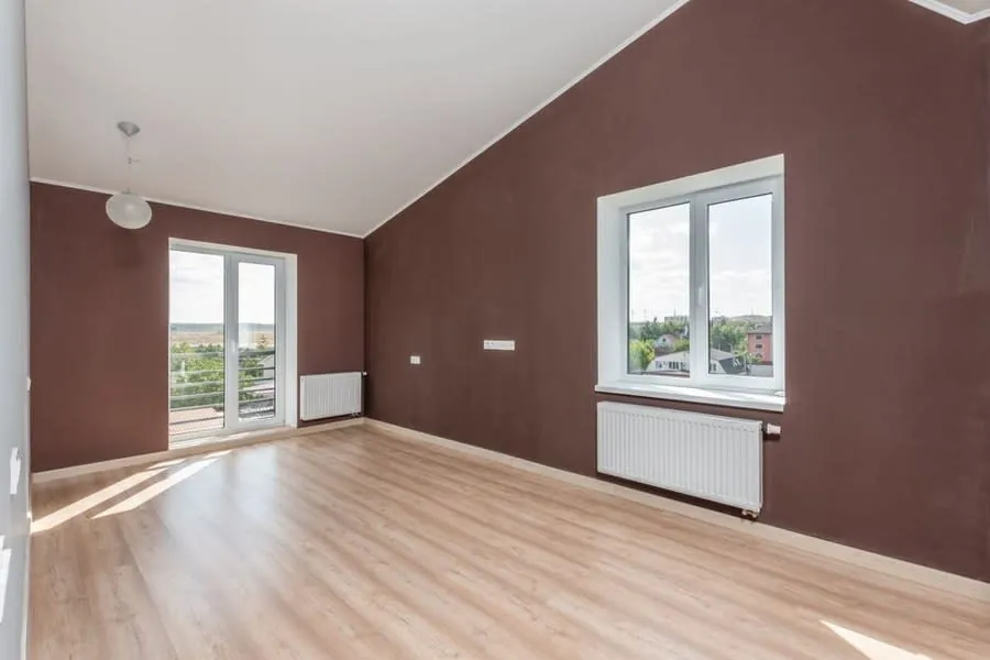 A room beneath a flat roof where condensation problems commonly show up
