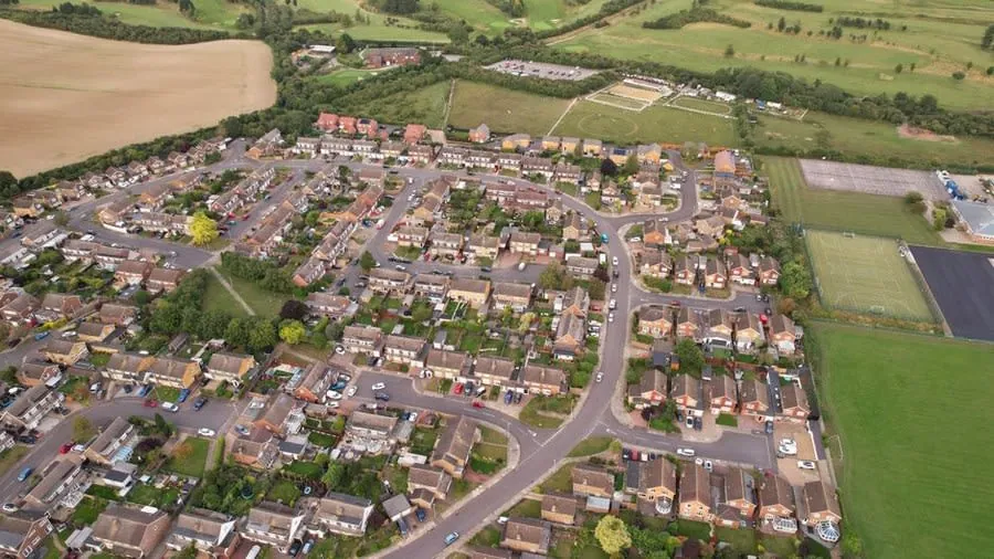 Estate housing near Weston-super-Mare with the flat-roofed garages that suit a sedum conversion