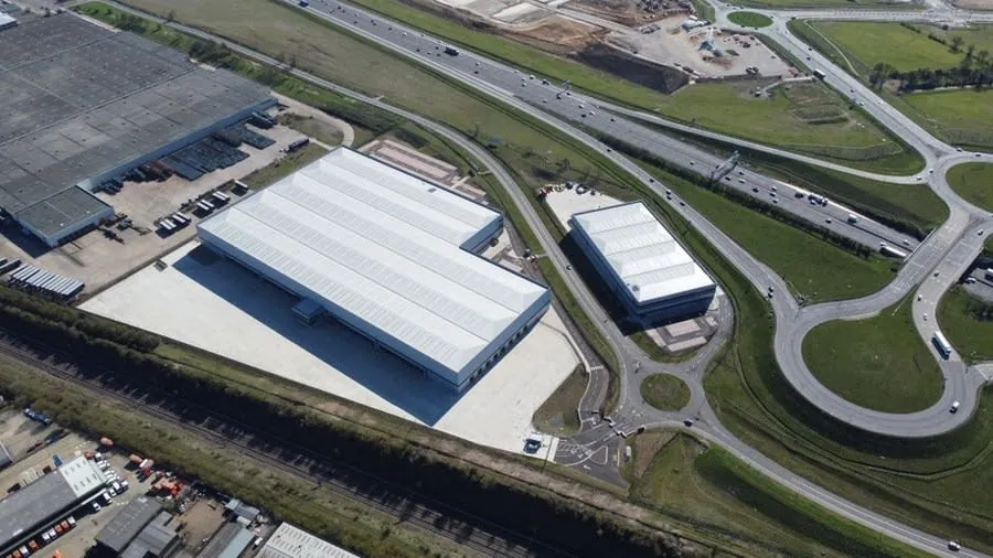 Flat-roofed industrial units near Weston-super-Mare, the kind of large roof area a ballasted solar array is usually proposed for