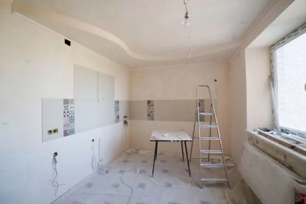 Repaired and redecorated ceiling after the flat roof above it was replaced